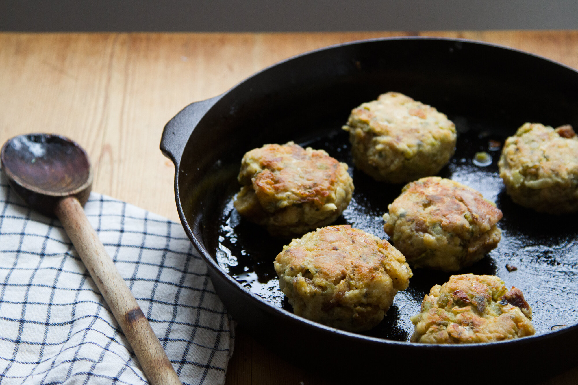 waste not panfried leftover stuffing patties with sautéed greens